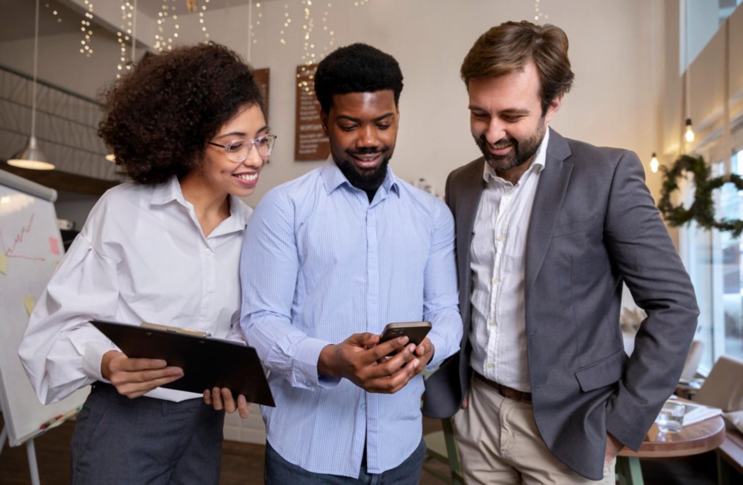 Investment analysis workspace with financial documents and laptop displaying market data