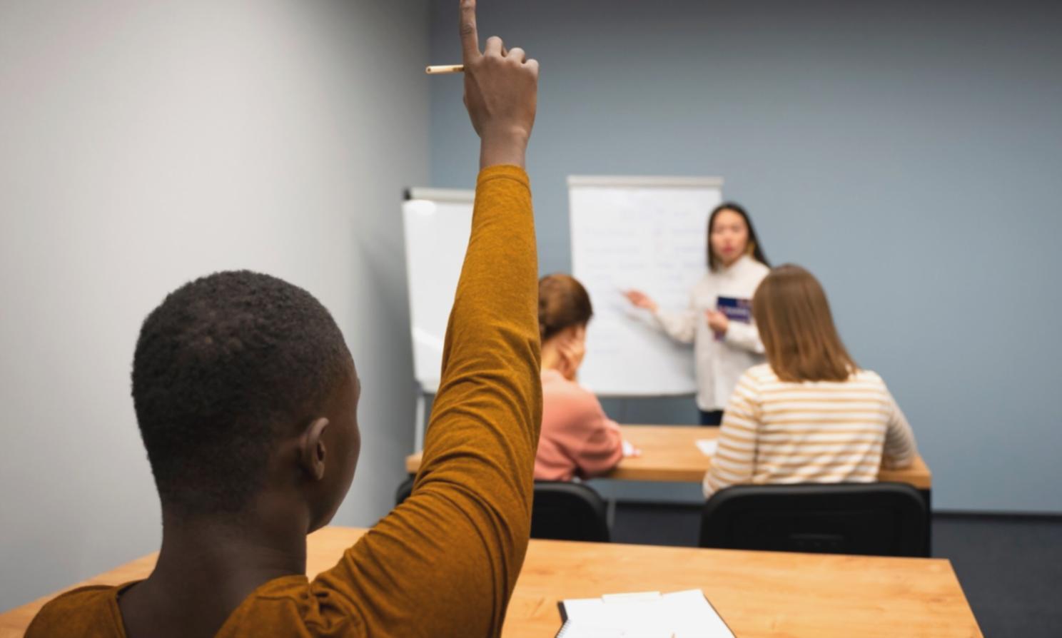 Investment education classroom with financial planning resources and learning materials